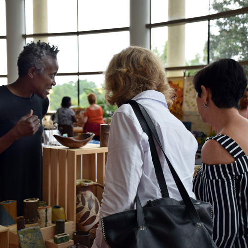 people at art market